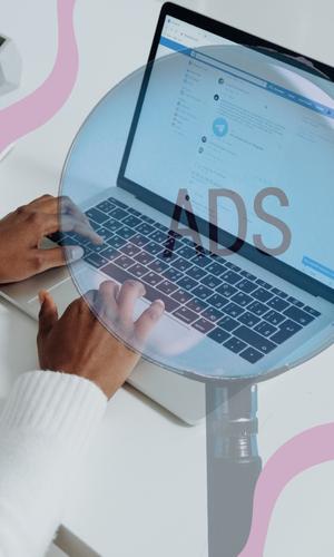 A woman browsing facebook ads on her laptop